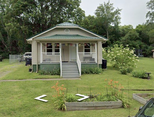 Front of house with two raised beds - 1509 Layman St