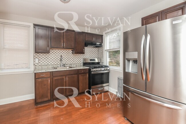 Building Photo - Prepare to be impressed by this 5-bedroom,...