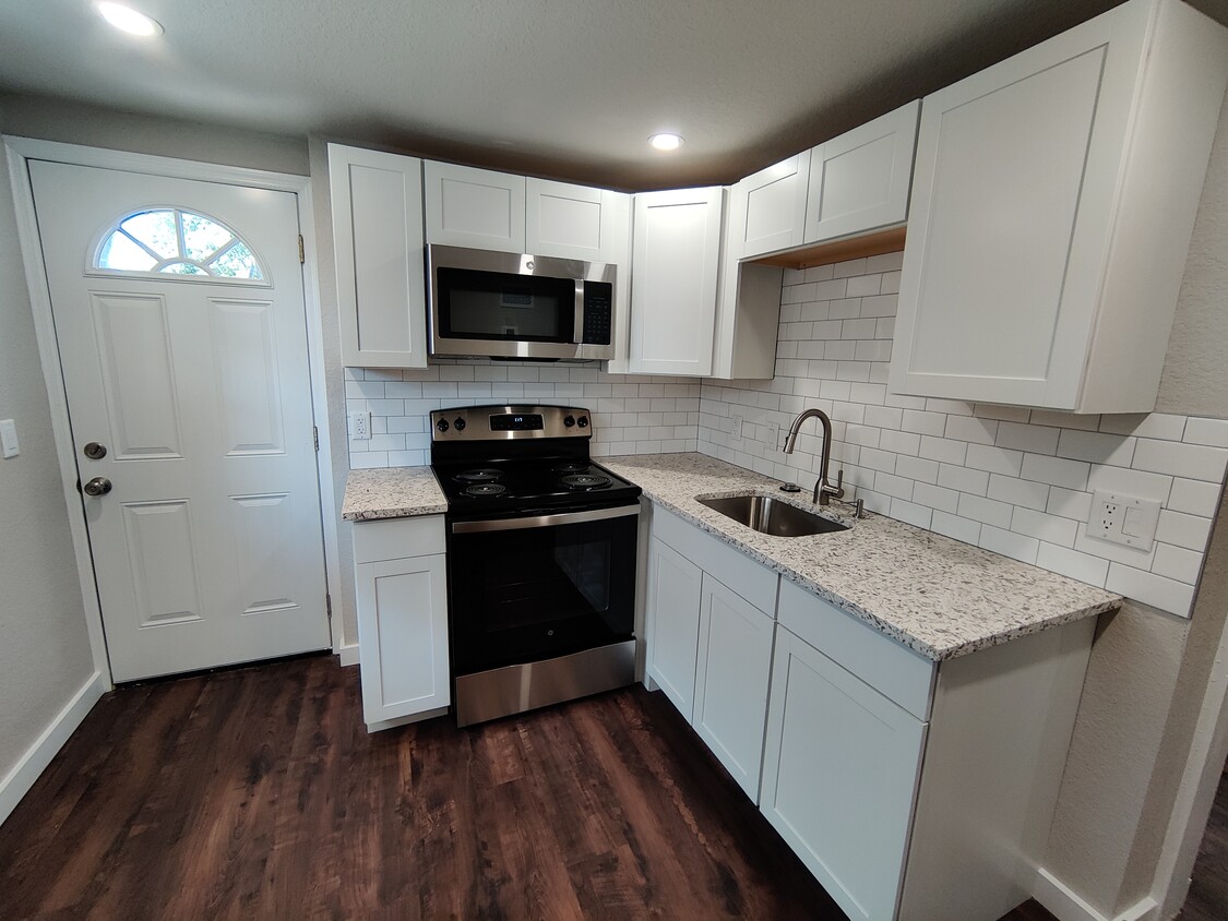 Kitchen with Stainless Steel Appliances and Garbage Disposal - 1814 26th St W