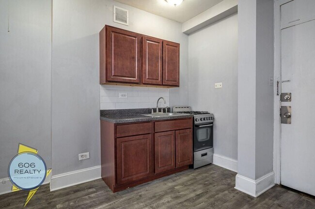 Foto del edificio - 6930 N Greenview Ave