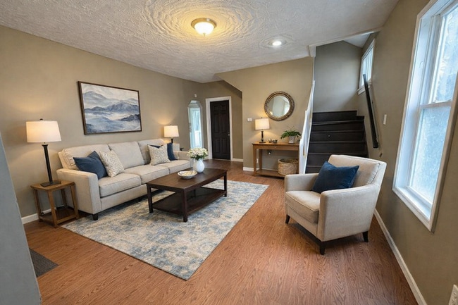 Building Photo - Classic Akron Home, Modern Convenience: Deck, First Floor Bedroom & Laundry and 2 Sunroom's