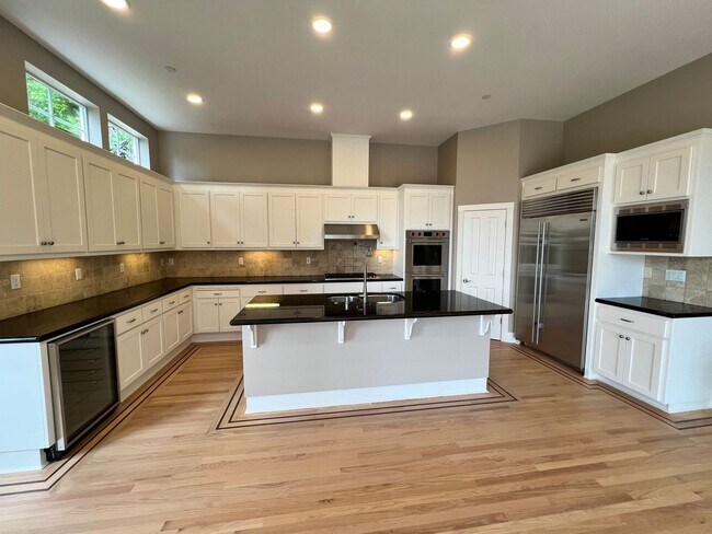 Building Photo - FABULOUS UPDATED FOUR BEDROOM TWO AND HALF...