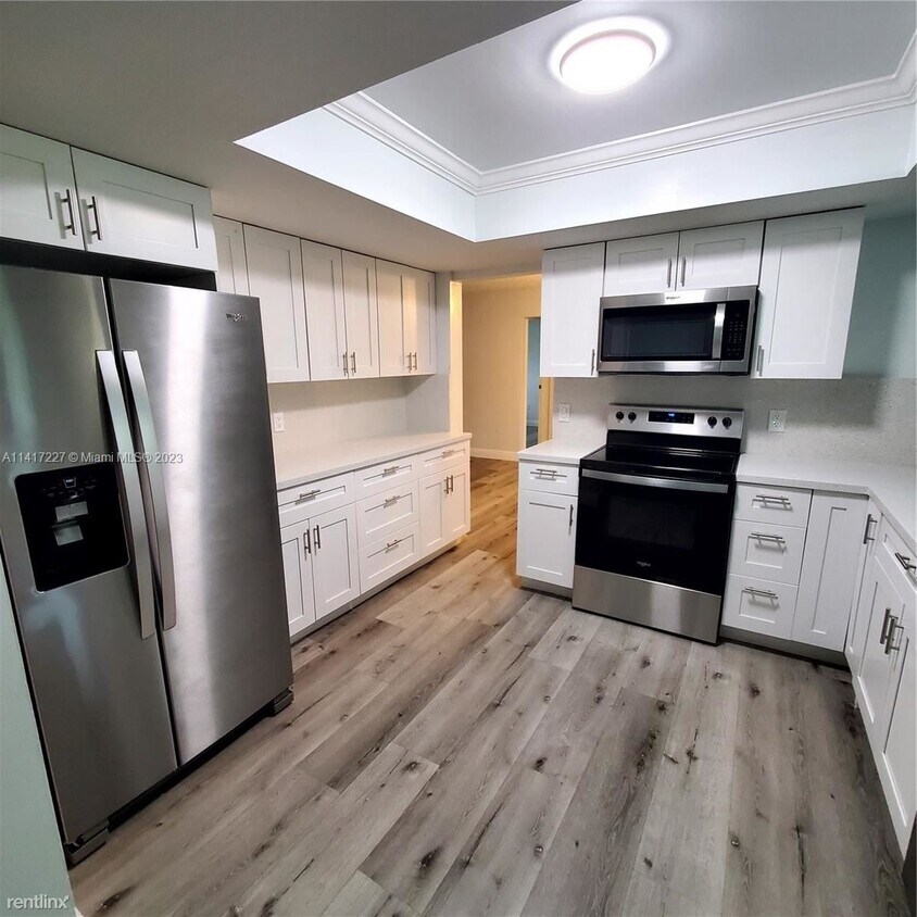 Foto principal - 3 br, 2 bath House - 9740 NW 25th St