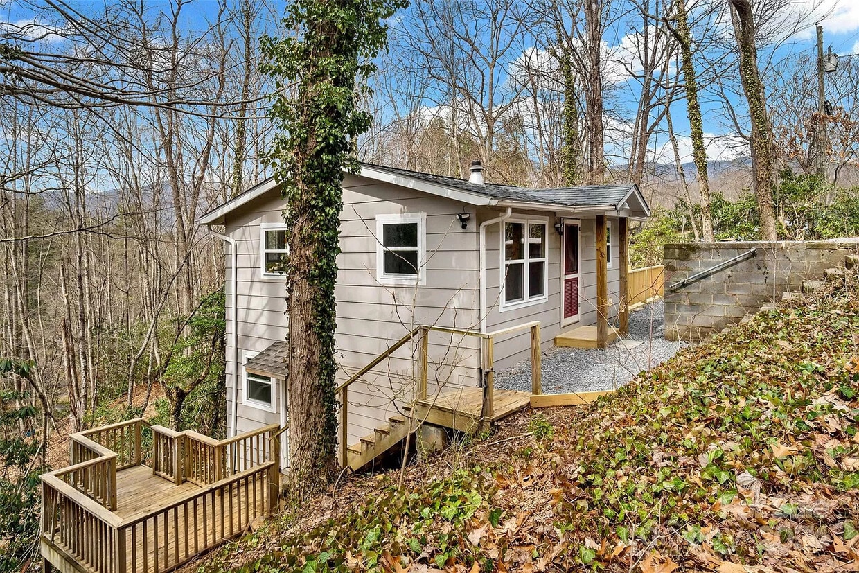 Outside shot featuring the private staircase leading to the second entrance. Balusters are installed - 228 Barrett Rd