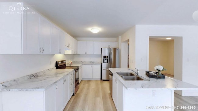 Building Photo - 1-547 Windfields Farm Dr W