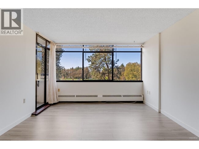 Building Photo - 6611 Minoru Blvd