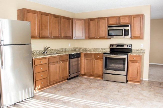 Building Photo - 4 br, 3 bath House - 6950 Jamestown Way Dr