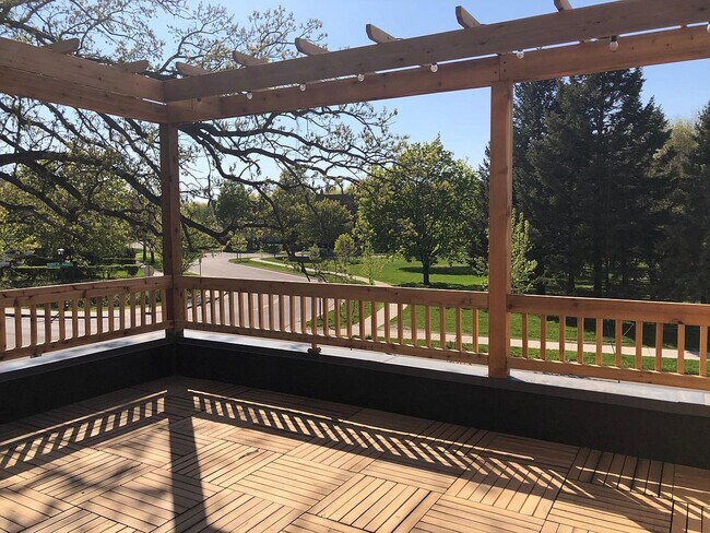Spacious private deck overlooking a gorgeous, wooded park. - 918 Raymond Ave