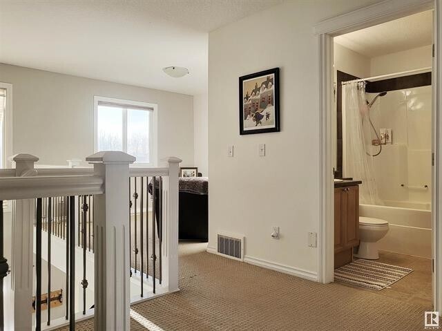 Photo du bâtiment - Duplex in Spacious 4-Bedroom Duplex • 3.5 Baths • Double Garage • Finished Basement