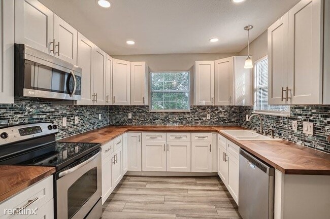 Building Photo - 3 br, 2 bath House - 3936 50Th Street N UNIT