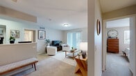 Located at 2070 Fox Pointe Dr in Aurora, Illinois, this single-floor residence accommodates four bedrooms and two full bathrooms within a compact, well-organized layout. The living room serves as the central gathering space, featuring neutral carpet, a sliding glass door that invites natural light and outdoor views, and an open sightline that connects seamlessly to the dining area. The dining room provides a dedicated space for meals, framed by neutral walls that lend a clean, understated aesthetic.

The kitchen is equipped with warm wood-toned cabinetry, light speckled countertops, a double stainless steel sink, a gas range, and a full-size refrigerator, all set above durable wood-look flooring. Both bathrooms feature tub/shower combinations with tiled surrounds, wood-toned vanities, and wood-look flooring. The primary bedroom offers a comfortably scaled retreat with carpet flooring and a walk-in closet with built-in shelving. Additional bedrooms provide similar carpeted finishes and closet storage. A dedicated laundry room houses a full-size washer and dryer alongside the water heater and furnace, adding practical convenience to the home's functional design.