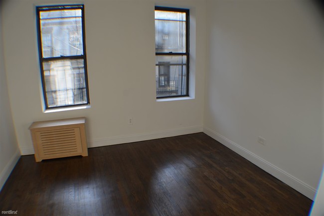 Building Photo - 214 E 89th St