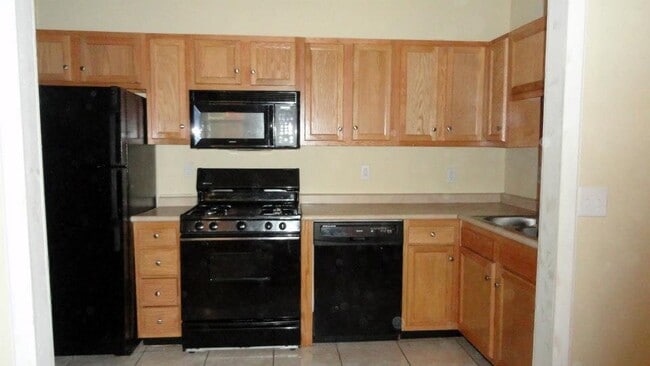 Kitchen with updated cabinets and appliances - 304 N 9th St