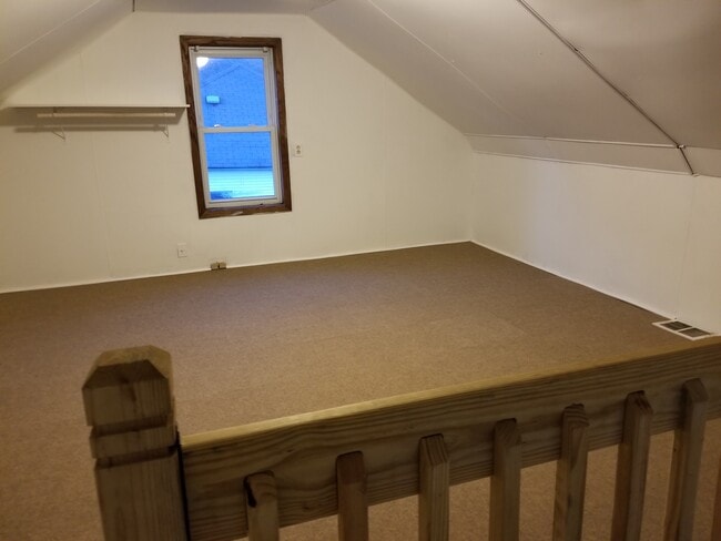 Building Photo - Gray House by Church