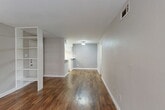 This 710 square foot apartment in Houston, TX offers a practical and modern living space. The single-floor layout includes two bedrooms, two bathrooms, and an open-concept kitchen and living area. The primary bedroom, measuring 160 square feet, provides ample space for comfort.

The kitchen showcases a contemporary design with white cabinetry, stainless steel appliances, and wood-look flooring. It features a galley-style layout with ample counter space and storage. The living area seamlessly connects to the kitchen, creating an open and airy feel.

Both bedrooms are carpeted for comfort, with the primary bedroom offering a large window for natural light. The bathrooms are efficiently designed, featuring clean white fixtures and wood-look flooring. 

Throughout the apartment, neutral-toned walls create a bright and versatile canvas for personalization. Large windows in the living area and bedrooms allow for plenty of natural light, enhancing the sense of space. The apartment also includes two closets for additional storage.

The property's layout maximizes the use of its 710 square feet, offering a balanced mix of private and communal spaces. Its location on Imperial Valley Drive provides easy access to local amenities and transportation routes.