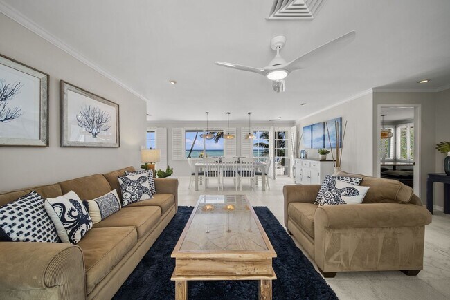 Foto del edificio - Immerse in Luxury & Tranquility at Beachfront 4BR Abode w/ Stunning Ocean Views