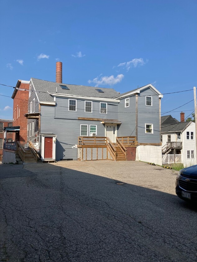 Laundry room is through the red door - 35 Main St