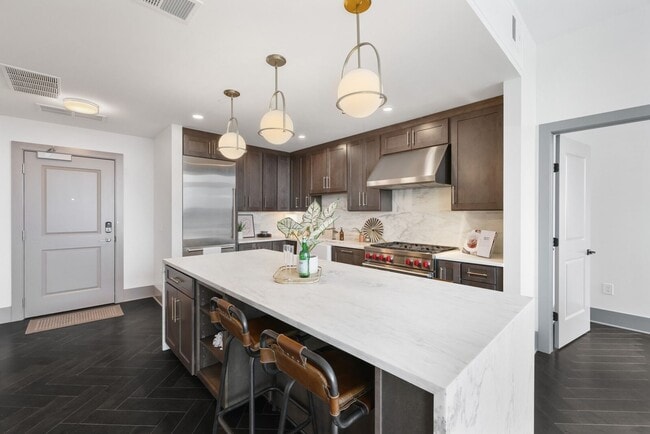 Building Photo - High-Rise Living 1st Month FREE