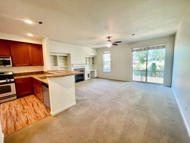 Building Photo - Cedar Hills/Mills Area Two Bedroom Townhome with 2 Car Garage, A/C & Private Deck.