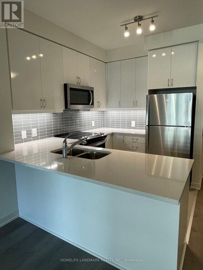 Photo du bâtiment - 4955-4955 Yonge St