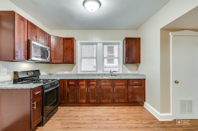 Building Photo - 7952 S Evans Ave