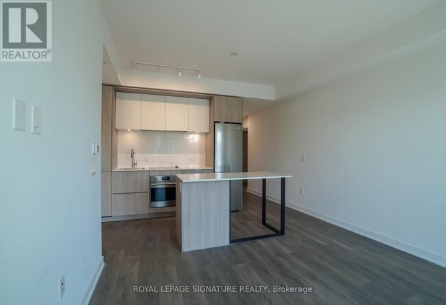 Photo du bâtiment - 130 River St