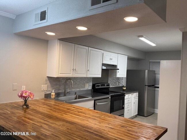 Building Photo - 11648 Dunes Way Dr N