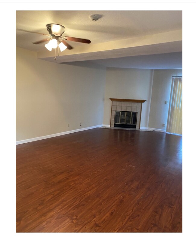 Living room with fireplace - 36859 Newark Blvd