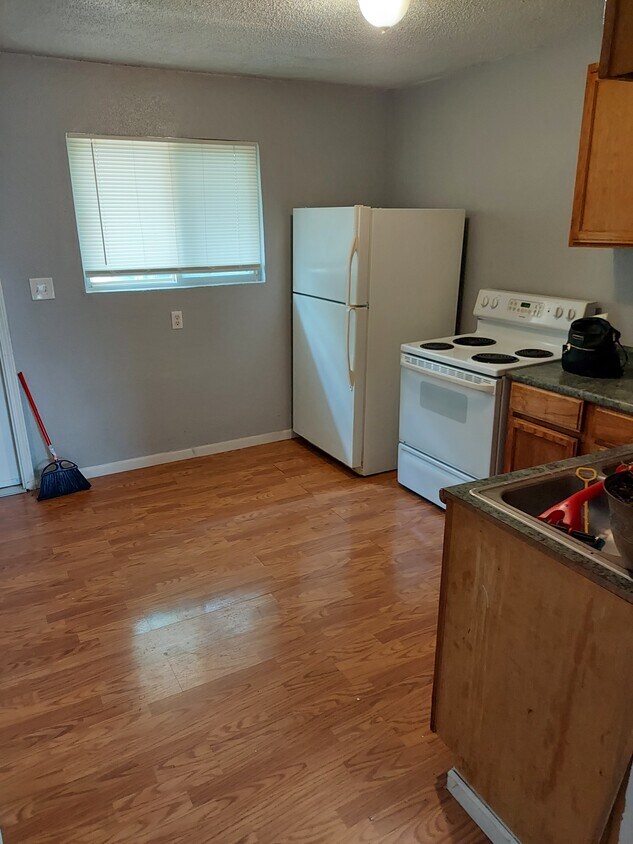 Kitchen- Fridge and range provided - 5531 Freeman Ct