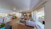 Located at 4640 Vegas Valley Dr in Las Vegas, NV, this single-floor unit offers three bedrooms and two bathrooms across a well-organized layout. The open-concept living and dining area is bright and welcoming, featuring warm hardwood-style flooring, neutral gray accent walls, and a sliding glass door that floods the space with natural light while providing outdoor access. The living room comfortably accommodates a full seating arrangement, and the adjacent dining area features a tray ceiling with a chandelier, adding a subtle architectural detail to the space.

The galley-style kitchen is efficiently designed with ample white cabinetry lining both walls, generous counter space, a double-basin sink, and direct access to the in-unit laundry area — a practical and convenient feature. The bedrooms are well-proportioned, with the primary bedroom offering comfortable dimensions, a ceiling fan with light fixture, and closet storage. Additional bedrooms feature vertical blinds and natural light. Both bathrooms are functional, each equipped with a tub-shower combination and hardwood-style flooring. Three closets and a dedicated hallway further enhance the storage and flow of this practical Las Vegas residence.