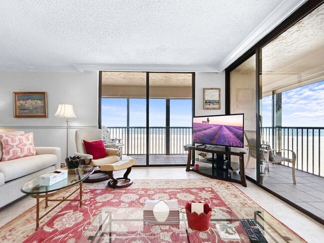 Foto del edificio - Luxurious Corner Unit with Stunning Floor-to-Ceiling Views!