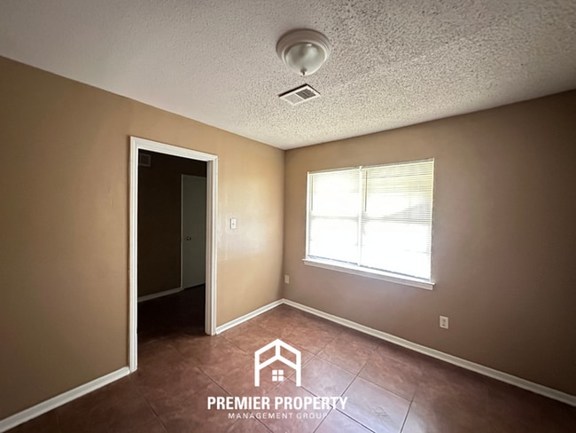Photo - Move-In Ready 4BR Home in 38134 - Airy Living Spaces & Private Backyard