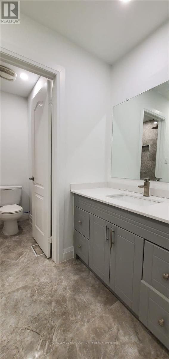 Photo du bâtiment - 5058 Oscar Peterson Blvd