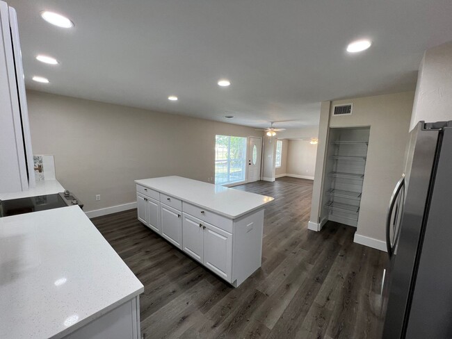 Building Photo - Rent this Newly Renovated and Spacious 4 B...