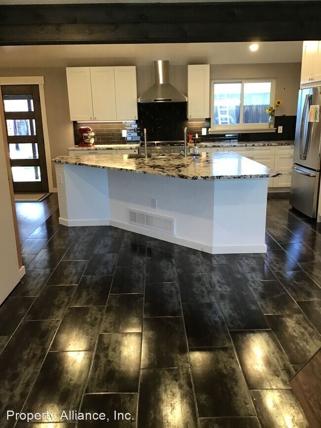 Foto del edificio - 3 br, 2.5 bath House - 8963 W. La Salle Av...
