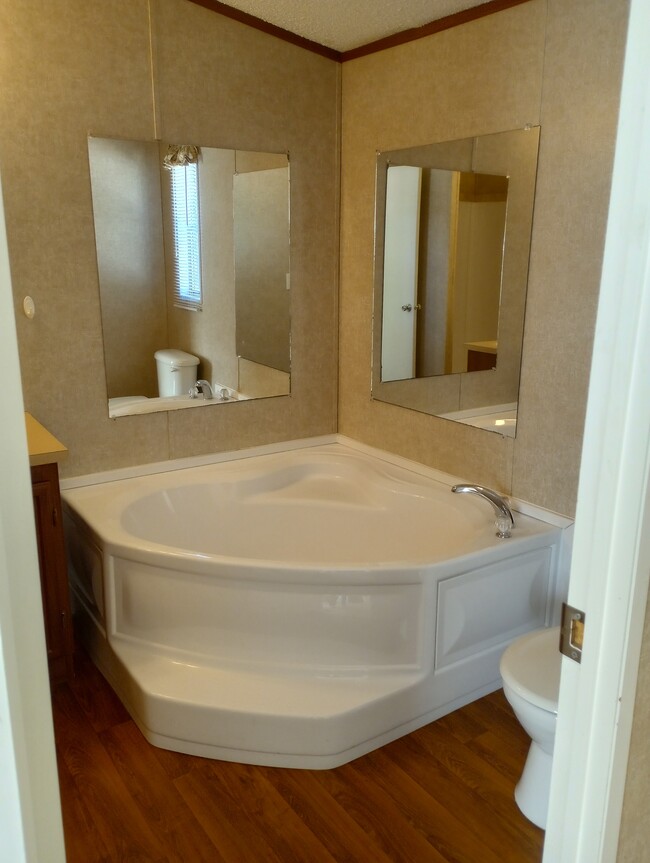 Primary bathroom has large tub and separate shower - 2135 13th St