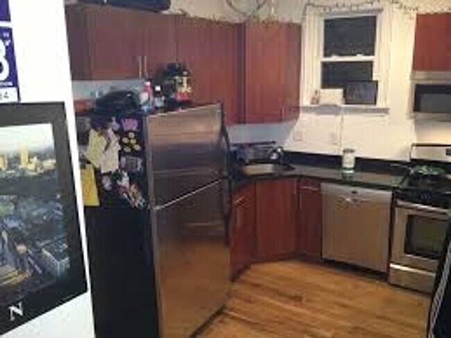 Building Photo - Renovated 5-bedroom duplex just outside Brigham Circle!, In-Unit Laundry, Porch