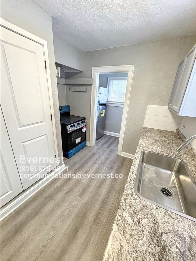 Building Photo - Charming 4-Bedroom Home with Finished Base...