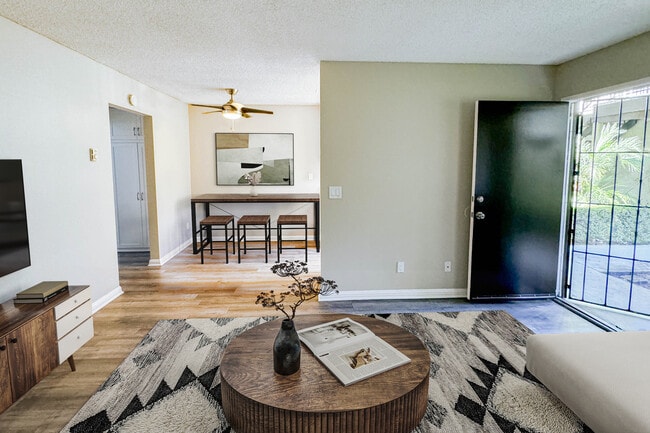 1 BR, 1 BA - Living Room - Orange Terrace Apartments