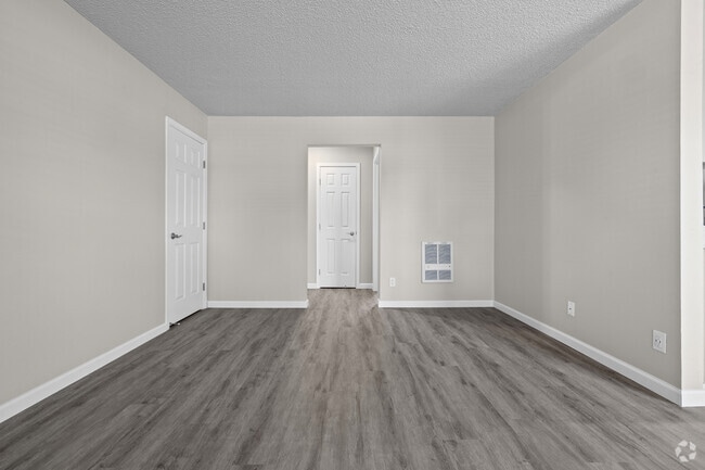 1BR, 1BA -650SF Living Room - Castle Apartments
