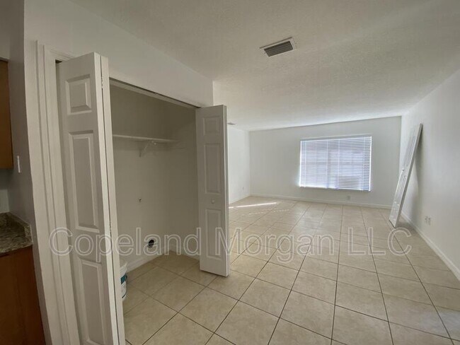 Building Photo - 5613 E 127th Ave