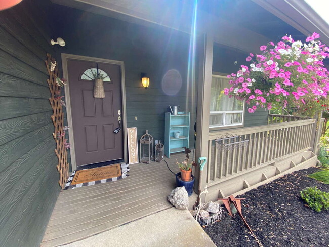 Building Photo - Spacious 4-bedroom with Panoramic Deck Nex...