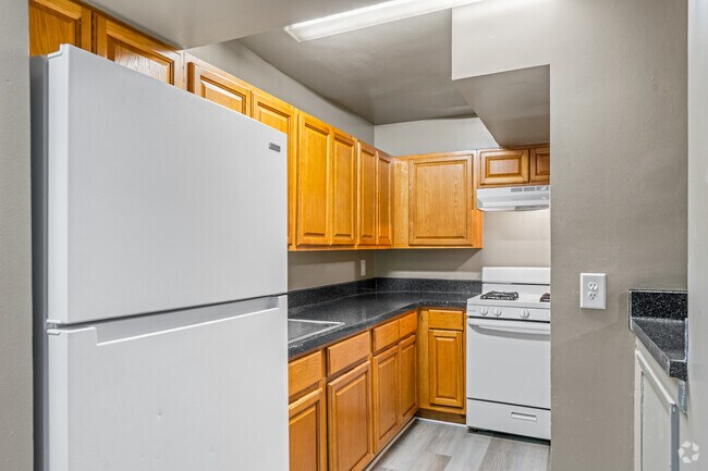 3 habitaciones, 1.5 baños - 818 pies cuadrados - Cocina - The Village at Chesapeake