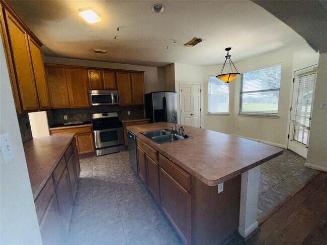 Foto del edificio - 1124 Winding Creek Pl