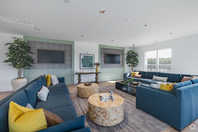 Asientos del salón del club - 1000 Metropolitan Residential