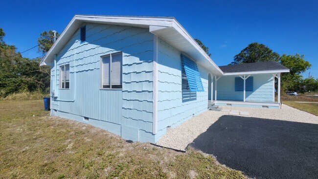Building Photo - Charming 3BR/2BA House in Lehigh MOVE IN SPECIAL 50% OFF FIRST MONTH RENT!