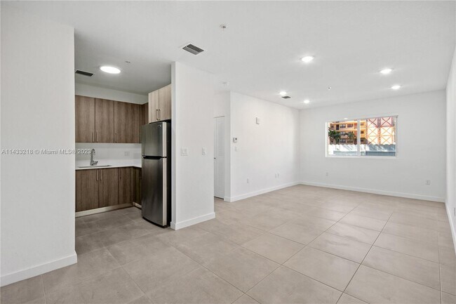 Building Photo - 1295 W 69th St