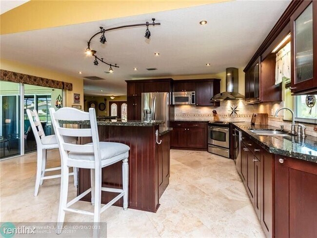 Foto del edificio - 4 br, 2.5 bath House - 1046 NW 108th Ln