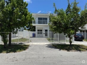 Building Photo - 6323 NW 1st Pl