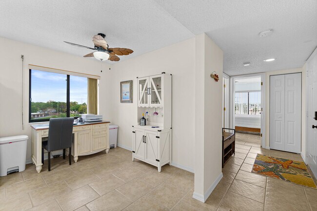 Building Photo - 5803 N Banana River Blvd